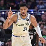 Milwaukee Bucks forward Giannis Antetokounmpo (34) reacts after scoring his 21,000th career point in the third quarter against the Brooklyn Nets at Fiserv Forum.