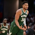 Oct 26, 2025; Cleveland, Ohio, USA; Milwaukee Bucks forward Giannis Antetokounmpo (34) celebrates after hitting a three point basket against the Cleveland Cavaliers during the second half at Rocket Arena. Mandatory Credit: Ken Blaze-Imagn Images