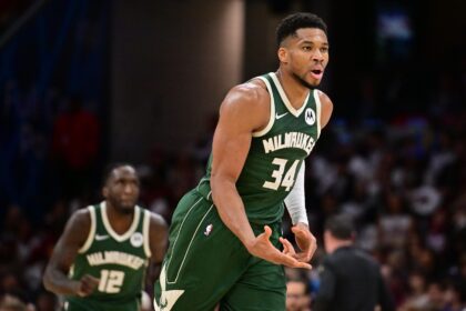 Oct 26, 2025; Cleveland, Ohio, USA; Milwaukee Bucks forward Giannis Antetokounmpo (34) celebrates after hitting a three point basket against the Cleveland Cavaliers during the second half at Rocket Arena. Mandatory Credit: Ken Blaze-Imagn Images
