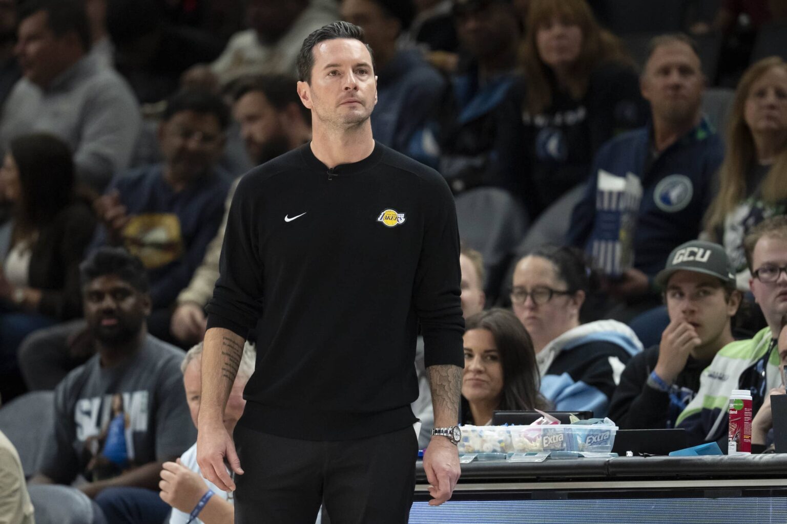 Los Angeles Lakers head coach JJ Redick looks on against the Minnesota Timberwolves in the second half at Target Center.