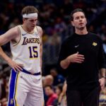 Nov 14, 2025; New Orleans, Louisiana, USA; Los Angeles Lakers guard Austin Reaves (15) talks to Head Coach JJ Redick on a time out against the New Orleans Pelicans during the first half at Smoothie King Center. Mandatory Credit: Stephen Lew-Imagn Images