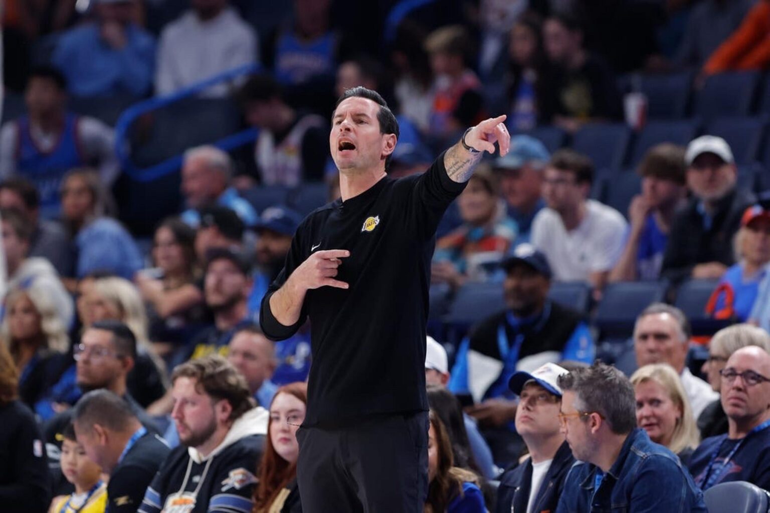 Nov 12, 2025; Oklahoma City, Oklahoma, USA; Los Angeles Lakers head coach JJ Redick gestures to his team during a play against the Oklahoma City Thunder during the fourth quarter at Paycom Center. Mandatory Credit: Alonzo Adams-Imagn Images