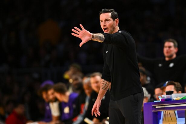 Nov 2, 2025; Los Angeles, California, USA; Los Angeles Lakers Head Coach JJ Redick reacts during the game against the Miami Heat during the first half at Crypto.com Arena. Mandatory Credit: Jonathan Hui-Imagn Images