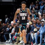 Nov 9, 2025; Memphis, Tennessee, USA; Memphis Grizzlies guard Ja Morant (12) reacts after a basket during the second quarter against the Oklahoma City Thunder at FedExForum. Mandatory Credit: Petre Thomas-Imagn Images