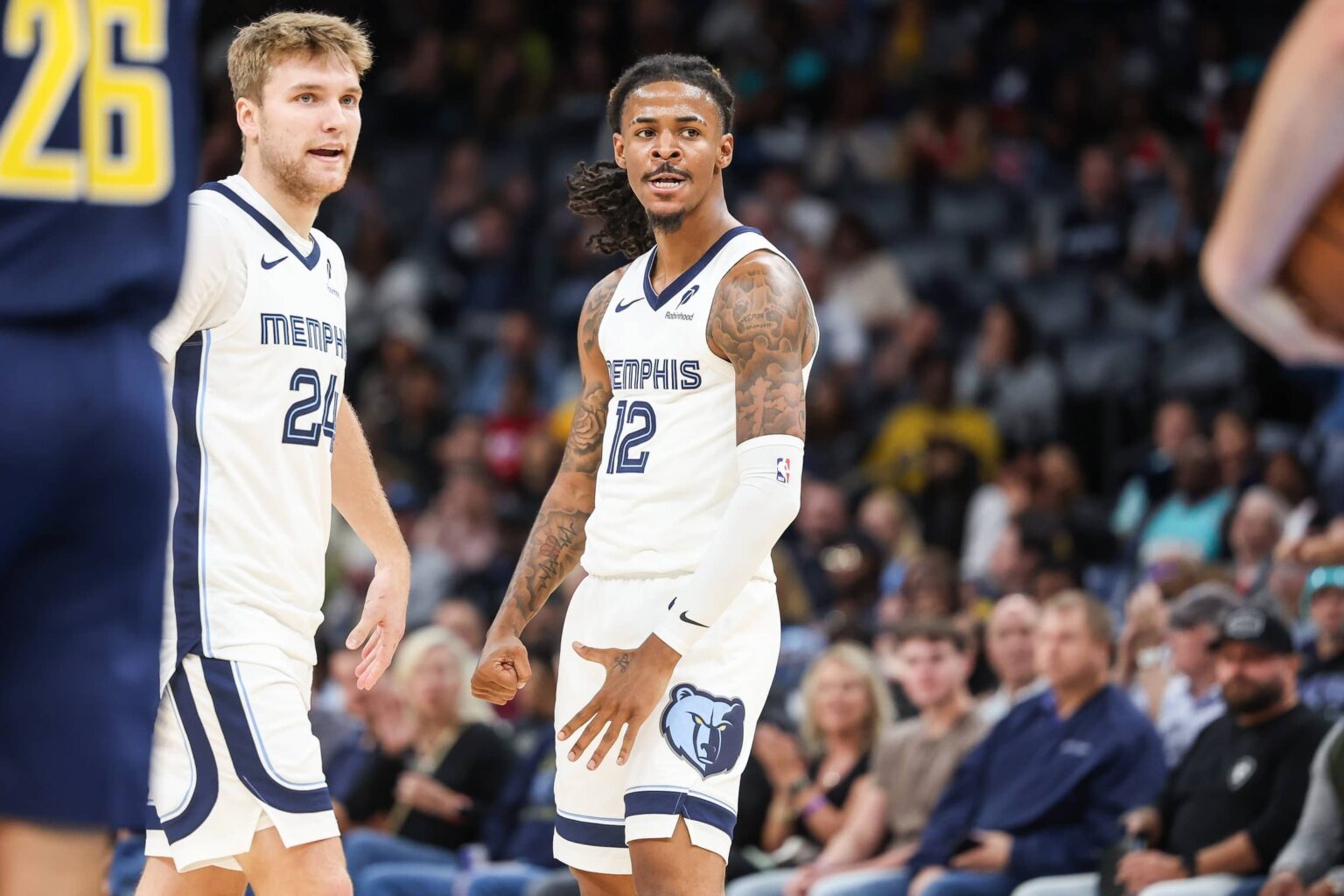 Memphis Grizzlies guard Ja Morant (12) reacts against the Indiana Pacers during the first half at FedExForum.