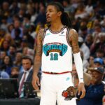 Memphis Grizzlies guard Ja Morant (12) looks on during the second quarter against the Dallas Mavericks at FedExForum.