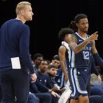 Nov 3, 2025; Memphis, Tennessee, USA; Memphis Grizzlies guard Ja Morant (12) checks into the game during the third quarter against the Detroit Pistons at FedExForum. Mandatory Credit: Petre Thomas-Imagn Images
