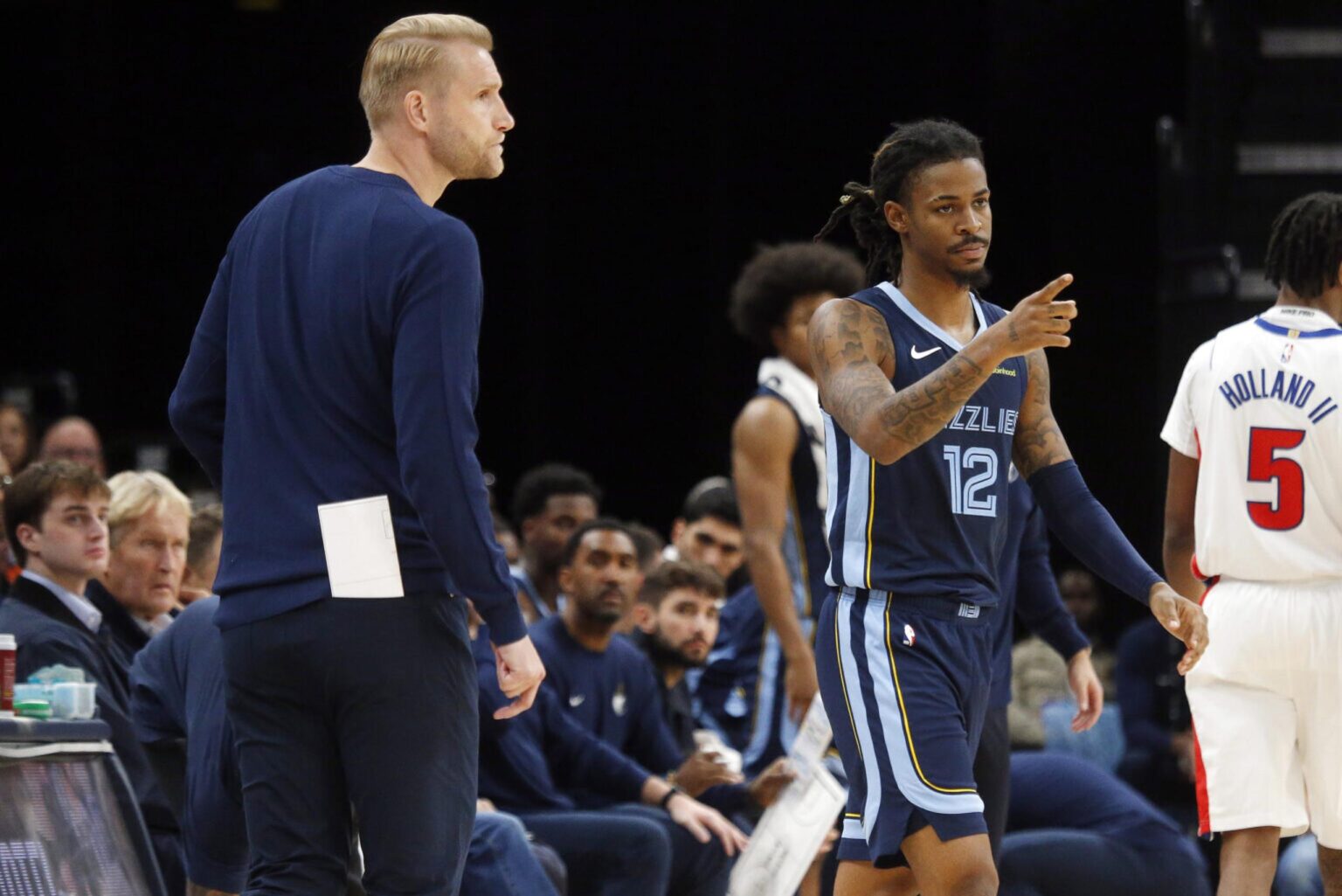 Nov 3, 2025; Memphis, Tennessee, USA; Memphis Grizzlies guard Ja Morant (12) checks into the game during the third quarter against the Detroit Pistons at FedExForum. Mandatory Credit: Petre Thomas-Imagn Images