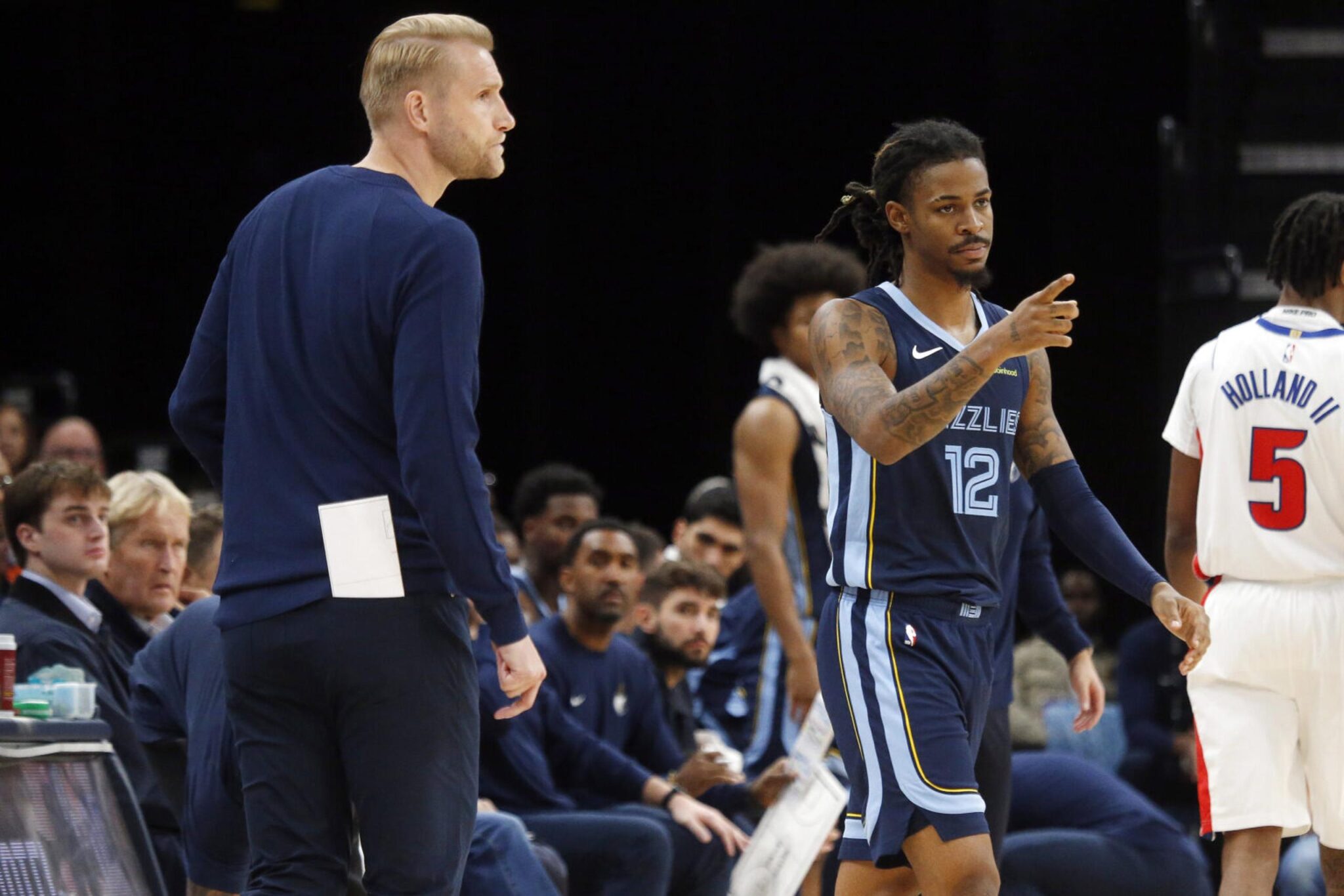 Nov 3, 2025; Memphis, Tennessee, USA; Memphis Grizzlies guard Ja Morant (12) checks into the game during the third quarter against the Detroit Pistons at FedExForum. Mandatory Credit: Petre Thomas-Imagn Images