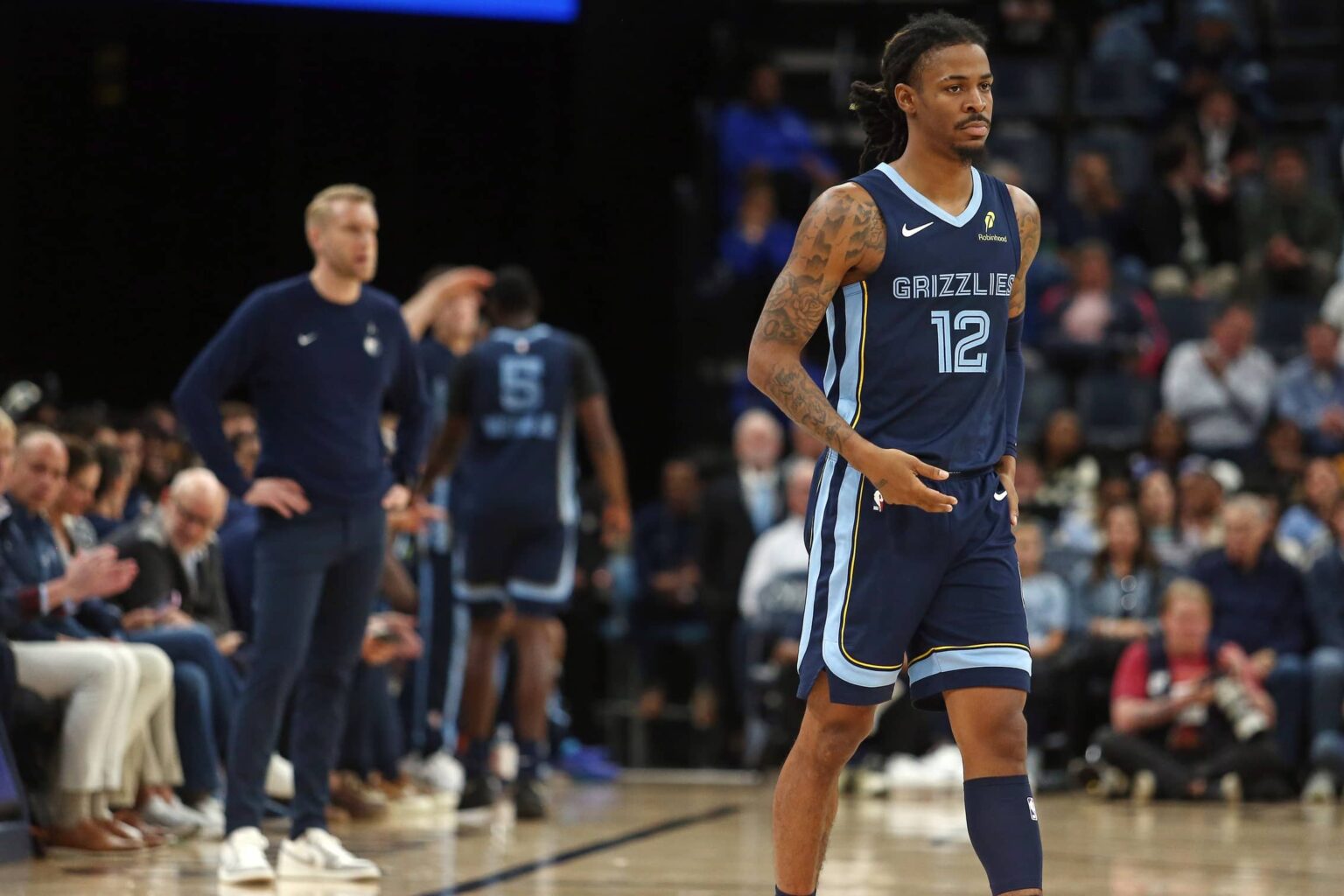 Memphis Grizzlies guard Ja Morant (12) checks into the game during the second quarter against the Detroit Pistons at FedExForum.