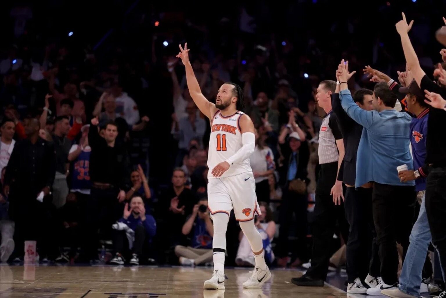 May 16, 2025; New York, New York, USA; New York Knicks guard Jalen Brunson (11) celebrates his three point shot against the Boston Celtics during the fourth quarter of game six in the second round of the 2025 NBA Playoffs at Madison Square Garden. Mandatory Credit: Brad Penner-Imagn Images