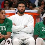 Oct 8, 2025; Memphis, Tennessee, USA; Boston Celtics forward Jayson Tatum (0) looks on from the bench during the second quarter against the Memphis Grizzlies at FedExForum. Mandatory Credit: Petre Thomas-Imagn Images