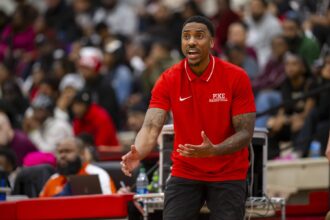 Pike High School head coach Jeff Teague reacts to action on the court during the first half of an IHSAA basketball game against Lawrence Central High School, Friday, Dec. 15, 2023, at Pike High School.