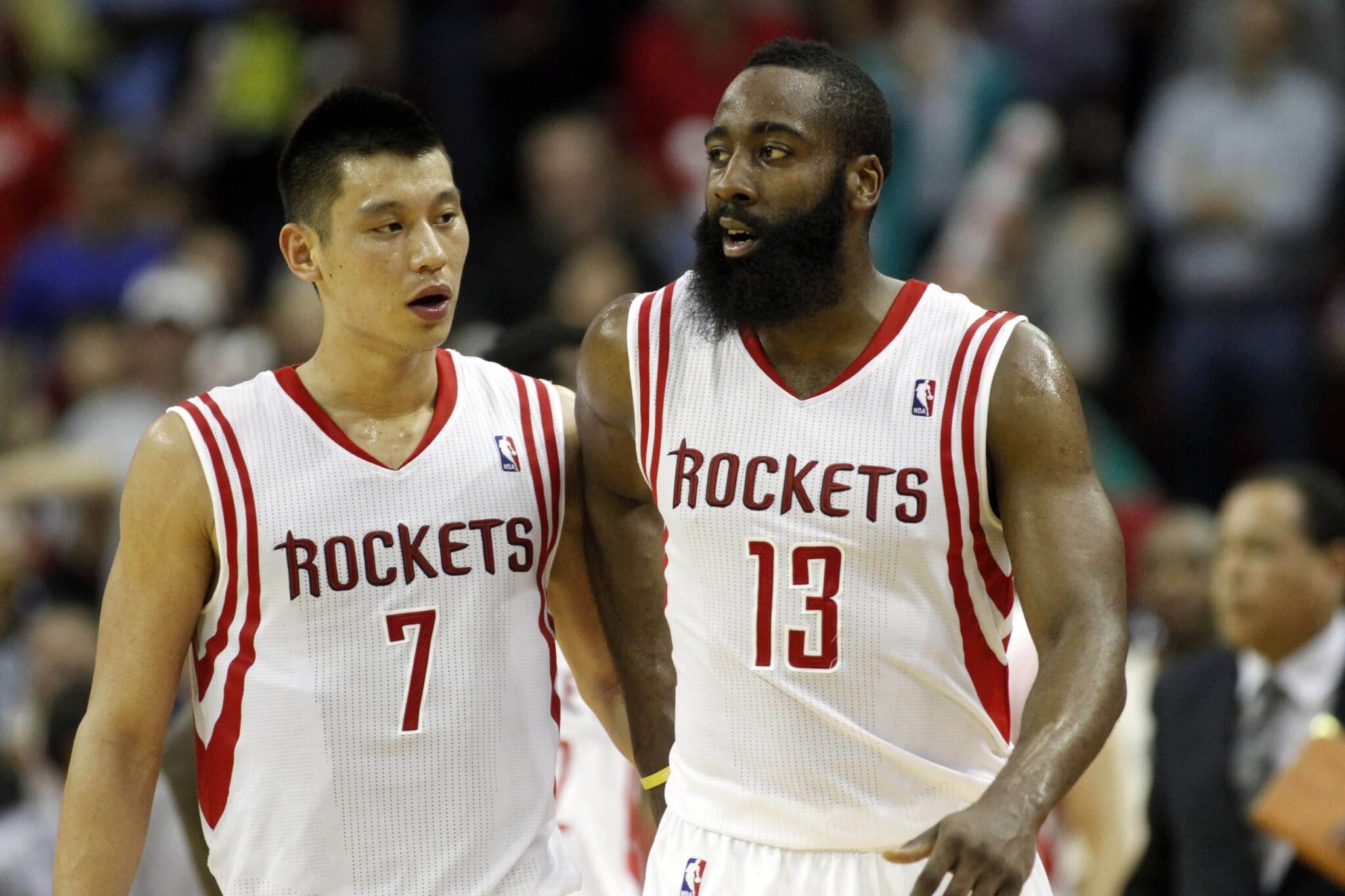 Houston Rockets point guard Jeremy Lin (7) talks to shooting guard James Harden (13) against the Memphis Grizzlies in the fourth quarter at the Toyota Center. The Grizzlies defeated the Rockets 82-78.