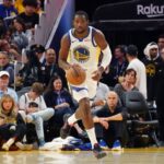 Oct 5, 2025; San Francisco, California, USA; Golden State Warriors forward Jonathan Kuminga (1) dribbles upcourt against the Los Angeles Lakers in the third quarter at Chase Center. Mandatory Credit: David Gonzales-Imagn Images