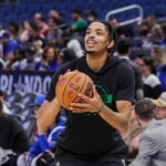 Boston Celtics forward Josh Minott (8) warms up before the game against the Orlando Magic at Kia Center.