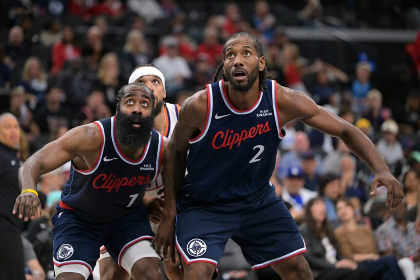 Los Angeles Clippers guard James Harden (1) and forward Kawhi Leonard (2) Phoenix Suns forward Dillon Brooks (3) in the second half against the Phoenix Suns at Intuit Dome.