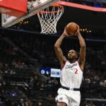 Oct 12, 2025; Inglewood, California, USA; Los Angeles Clippers forward Kawhi Leonard (2) dunks against the Denver Nuggets during the first quarter at Intuit Dome. Mandatory Credit: Jonathan Hui-Imagn Images
