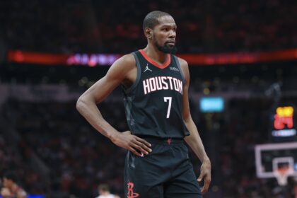 Houston Rockets forward Kevin Durant (7) reacts after a play during the fourth quarter against the Denver Nuggets at Toyota Center.