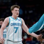 Charlotte Hornets guard Kon Knueppel (7) reacts after a three point basket during the first half against the New Orleans Pelicans at Smoothie King Center.