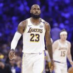 Apr 6, 2025; Oklahoma City, Oklahoma, USA; Los Angeles Lakers forward LeBron James (23) walks down the court after a play against the Oklahoma City Thunder during the second quarter at Paycom Center. Mandatory Credit: Alonzo Adams-Imagn Images