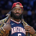Los Angeles Lakers forward LeBron James poses in the Arizona Wildcats jersey of his son Bryce James (6) during the game against the Minnesota Timberwolves at Crypto.com Arena.