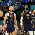 United States shooting guard Stephen Curry (4) and guard LeBron James (6) react in the second half against France in the men's basketball gold medal game during the Paris 2024 Olympic Summer Games at Accor Arena.