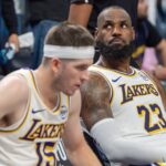 Apr 27, 2025; Minneapolis, Minnesota, USA; Los Angeles Lakers forward LeBron James (23) reacts to a replay that confirms he fouled Minnesota Timberwolves guard Anthony Edwards (5) in the fourth quarter during game four of first round for the 2025 NBA Playoffs at Target Center. Mandatory Credit: Matt Blewett-Imagn Images