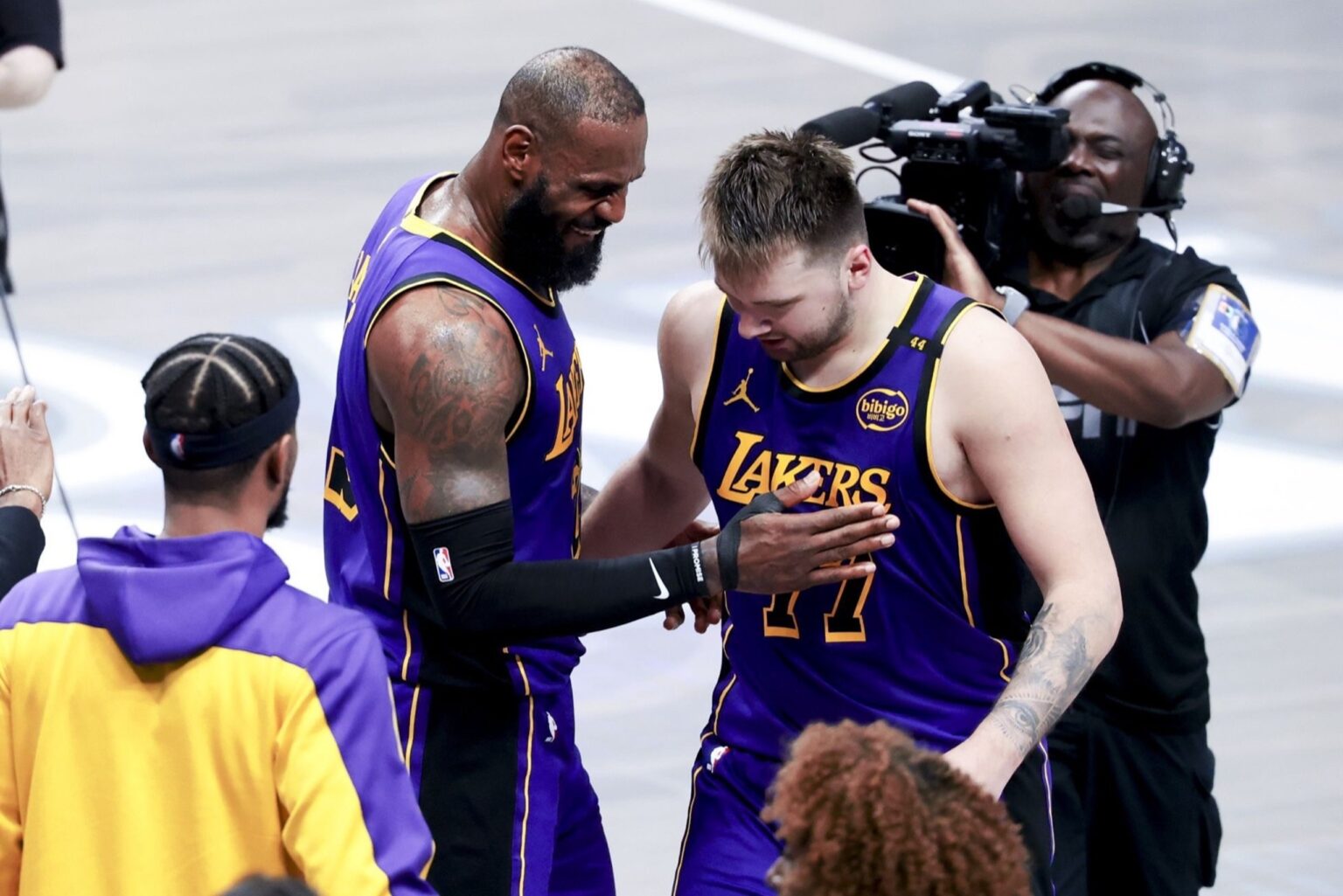 Apr 9, 2025; Dallas, Texas, USA; Los Angeles Lakers forward LeBron James (23) celebrates with Los Angeles Lakers guard Luka Doncic (77) during the fourth quarter against the Dallas Mavericks at American Airlines Center. Mandatory Credit: Kevin Jairaj-Imagn Images