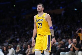 Oct 24, 2025; Los Angeles, California, USA; Los Angeles Lakers guard Luka Doncic (77) reacts in the second half against the Minnesota Timberwolves at Crypto.com Arena. Mandatory Credit: Kirby Lee-Imagn Images