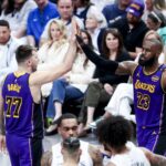 Los Angeles Lakers guard Luka Doncic (77) and forward LeBron James (23) during the second quarter against the Minnesota Timberwolves at Crypto.com Arena.