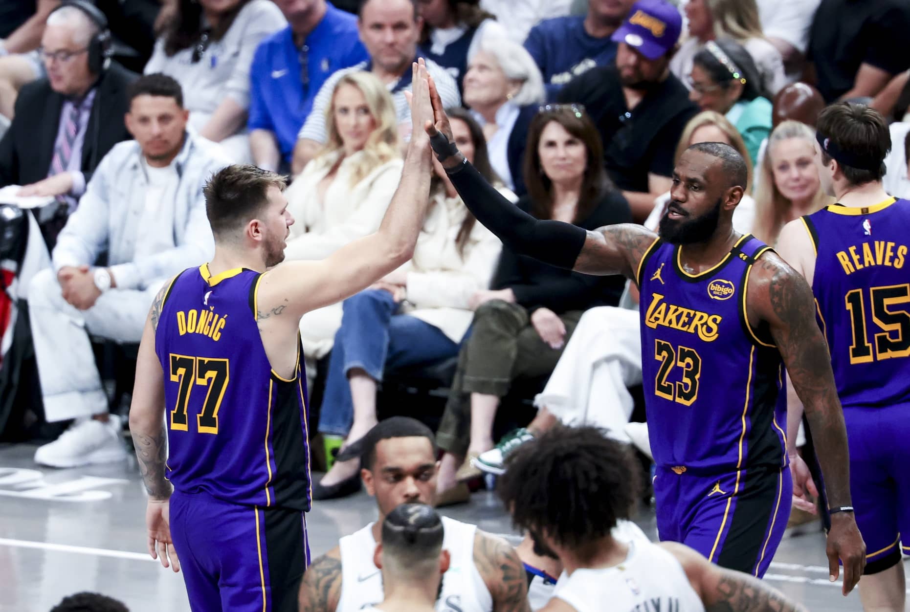 Los Angeles Lakers guard Luka Doncic (77) and forward LeBron James (23) during the second quarter against the Minnesota Timberwolves at Crypto.com Arena.