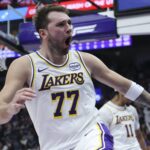 Los Angeles Lakers guard Luka Doncic (77) reacts to a play against the Utah Jazz during the second quarter at Delta Center.