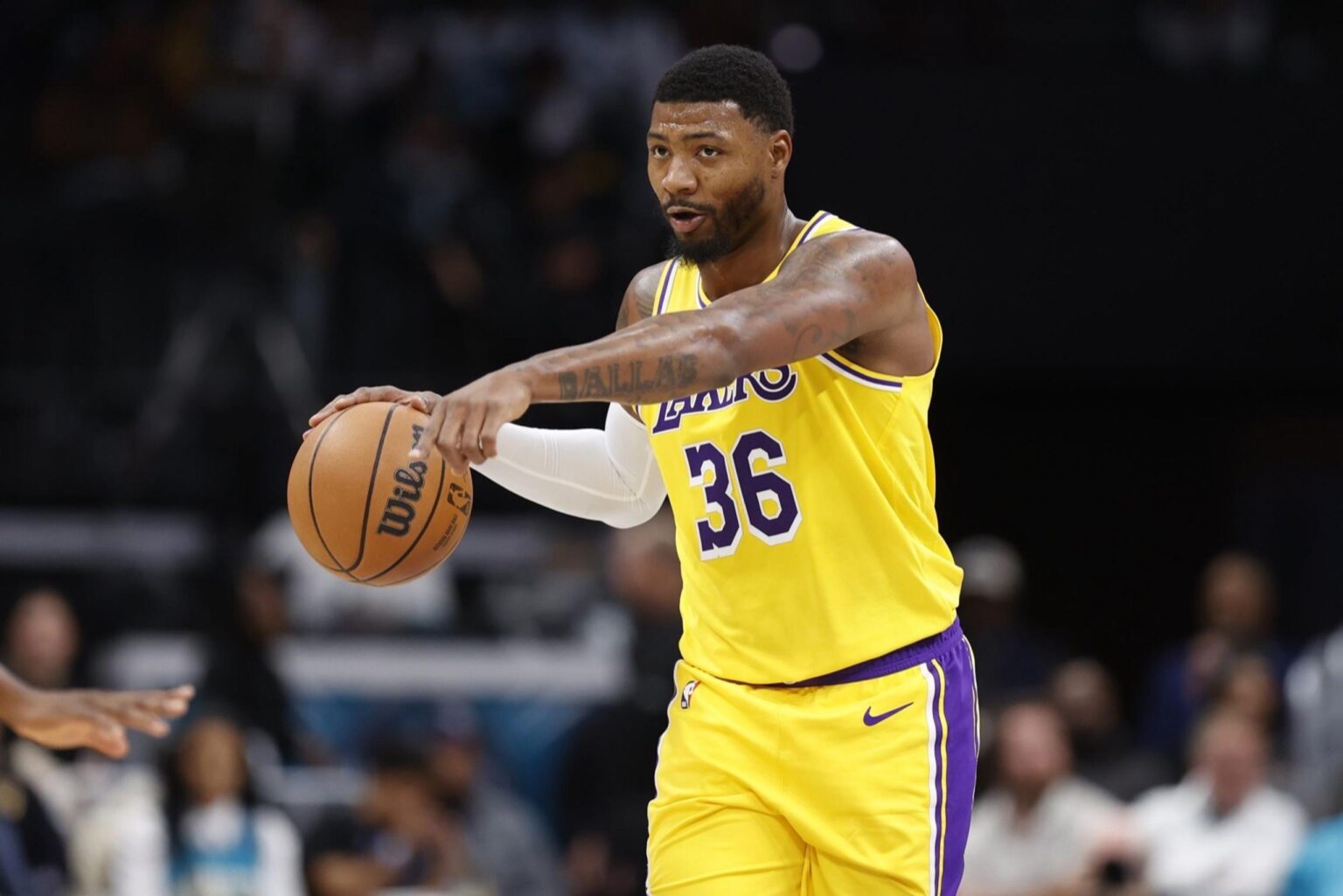 Nov 10, 2025; Charlotte, North Carolina, USA; Los Angeles Lakers guard Marcus Smart (36) directs the offense during the second quarter against the Charlotte Hornets at Spectrum Center. Mandatory Credit: Brian Westerholt-Imagn Images