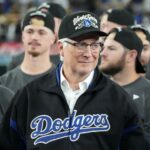 Oct 17, 2025; Los Angeles, California, USA; Los Angeles Dodgers owner Mark Walter reacts after game four of the NLCS round for the 2025 MLB playoffs against the Milwaukee Brewers at Dodger Stadium. Mandatory Credit: Kirby Lee-Imagn Images
