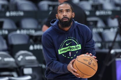 Minnesota Timberwolves guard Mike Conley (10) warms up before the game against the Utah Jazz at Delta Center.