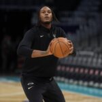 Milwaukee Bucks center Myles Turner (3) shoots during pregame warm ups against the Charlotte Hornets at Spectrum Center.