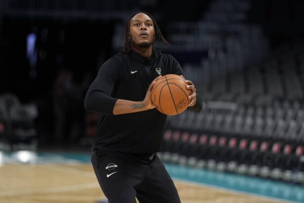 Milwaukee Bucks center Myles Turner (3) shoots during pregame warm ups against the Charlotte Hornets at Spectrum Center.