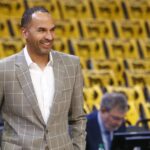 Apr 18, 2025; Memphis, Tennessee, USA; Dallas Mavericks general manager Nico Harrison watches warm ups prior to a game against the Memphis Grizzlies at FedExForum. Mandatory Credit: Petre Thomas-Imagn Images
