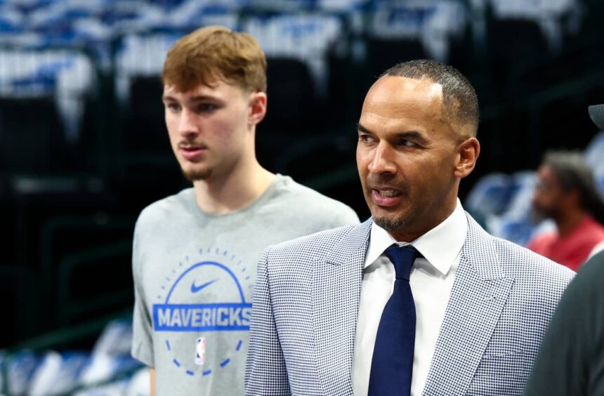 Dallas Mavericks general manager Nico Harrison and Dallas Mavericks forward Cooper Flagg (32) before the game against the San Antonio Spurs at American Airlines Center.