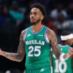 Nov 10, 2025; Dallas, Texas, USA; Dallas Mavericks forward P.J. Washington (25) reacts against the Milwaukee Bucks during the first quarter at American Airlines Center. Mandatory Credit: Kevin Jairaj-Imagn Images