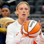 Indiana Fever guard Sophie Cunningham (8) warms up before a game Friday, Aug. 15, 2025, at Gainbridge Fieldhouse in Indianapolis.