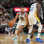 Golden State Warriors guard Stephen Curry (30) dribbles around a screen by forward Draymond Green (23) in the second half against the San Antonio Spurs at Frost Bank Center.