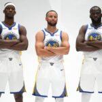 Golden State Warriors guard Stephen Curry (30), forward Draymond Green (23), and forward Jimmy Butler III (10) pose for a photo during Media Day at the Chase Center.