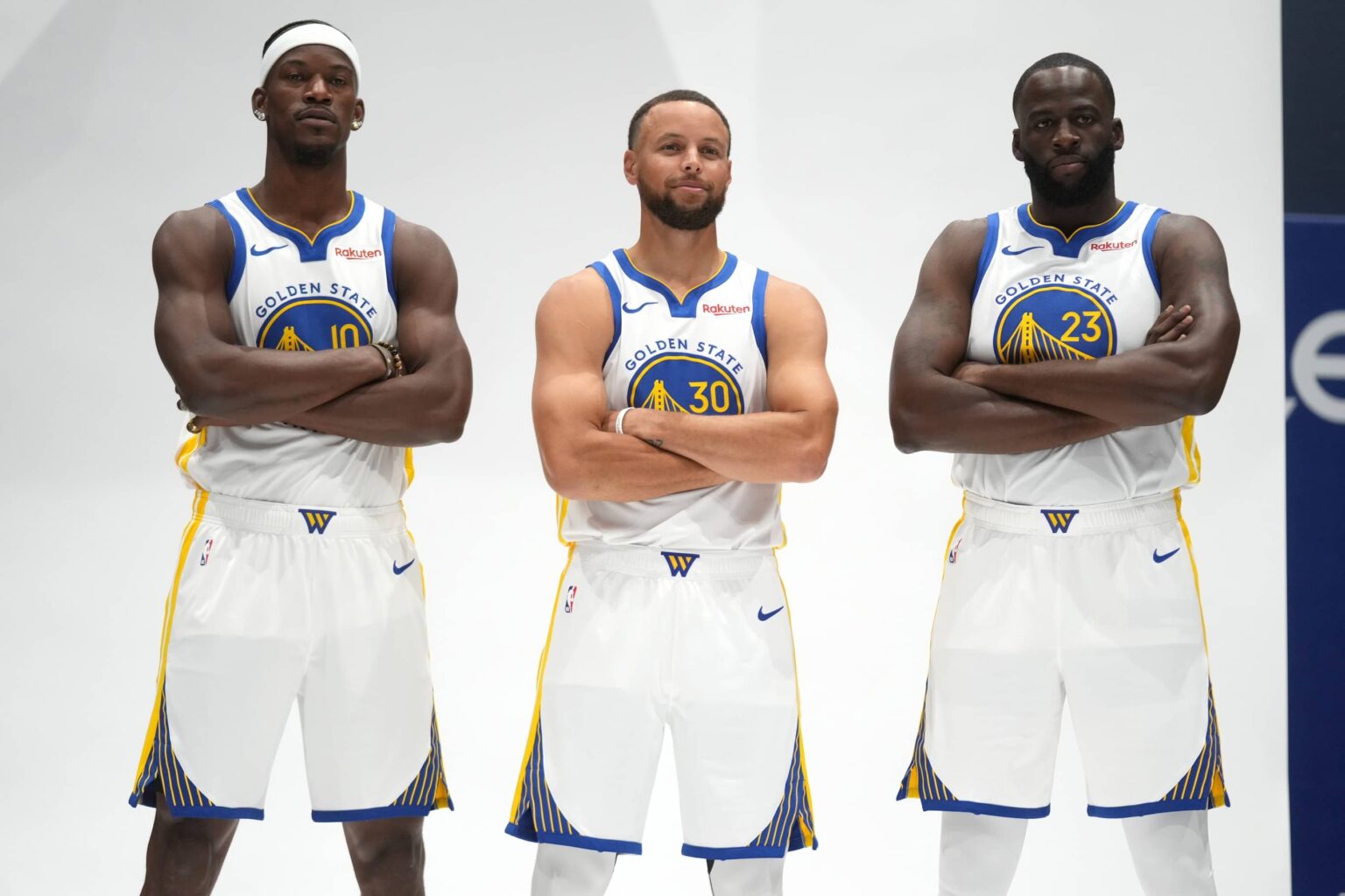 Golden State Warriors guard Stephen Curry (30), forward Draymond Green (23), and forward Jimmy Butler III (10) pose for a photo during Media Day at the Chase Center.