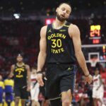 Golden State Warriors guard Stephen Curry (30) reacts during game seven of the first round for the 2025 NBA Playoffs against the Houston Rockets at Toyota Center.