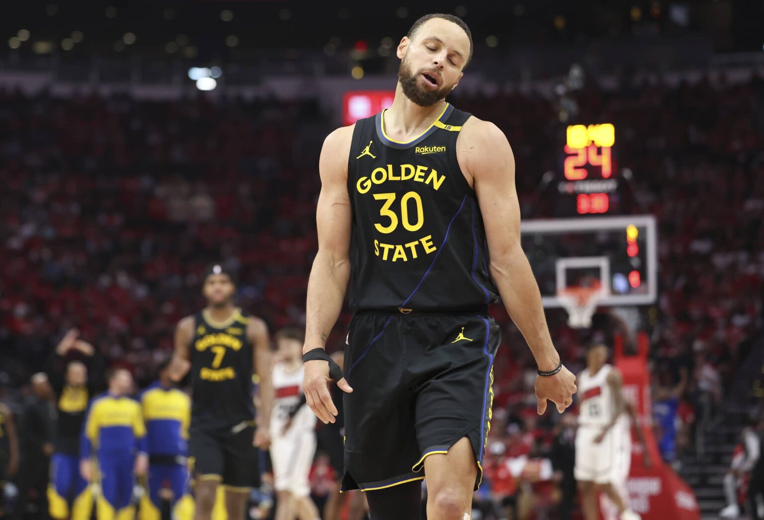 Golden State Warriors guard Stephen Curry (30) reacts during game seven of the first round for the 2025 NBA Playoffs against the Houston Rockets at Toyota Center.