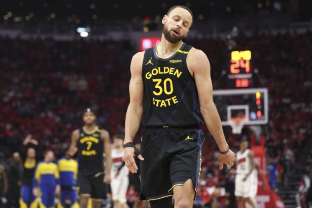 Golden State Warriors guard Stephen Curry (30) reacts during game seven of the first round for the 2025 NBA Playoffs against the Houston Rockets at Toyota Center.
