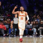 Apr 11, 2025; Philadelphia, Pennsylvania, USA; Atlanta Hawks guard Trae Young (11) reacts after scoring against the Philadelphia 76ers in the fourth quarter at Wells Fargo Center. Mandatory Credit: Kyle Ross-Imagn Images