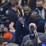 Feb 20, 2022; Cleveland, Ohio, USA; Lebron James and Michael Jordan on court during halftime during the 2022 NBA All-Star Game at Rocket Mortgage FieldHouse. Mandatory Credit: David Richard-USA TODAY Sports